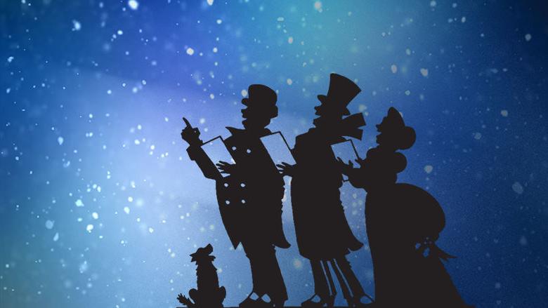 Carolers in Silhouette over a blue, snowy sky